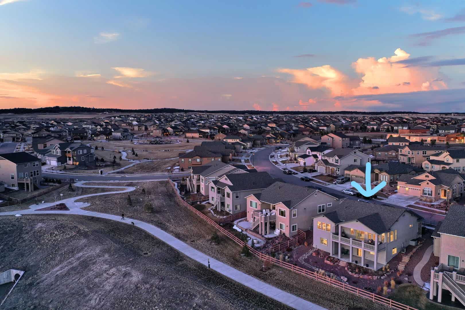 Aerial View of Back of Home w/Neighborhood Trails