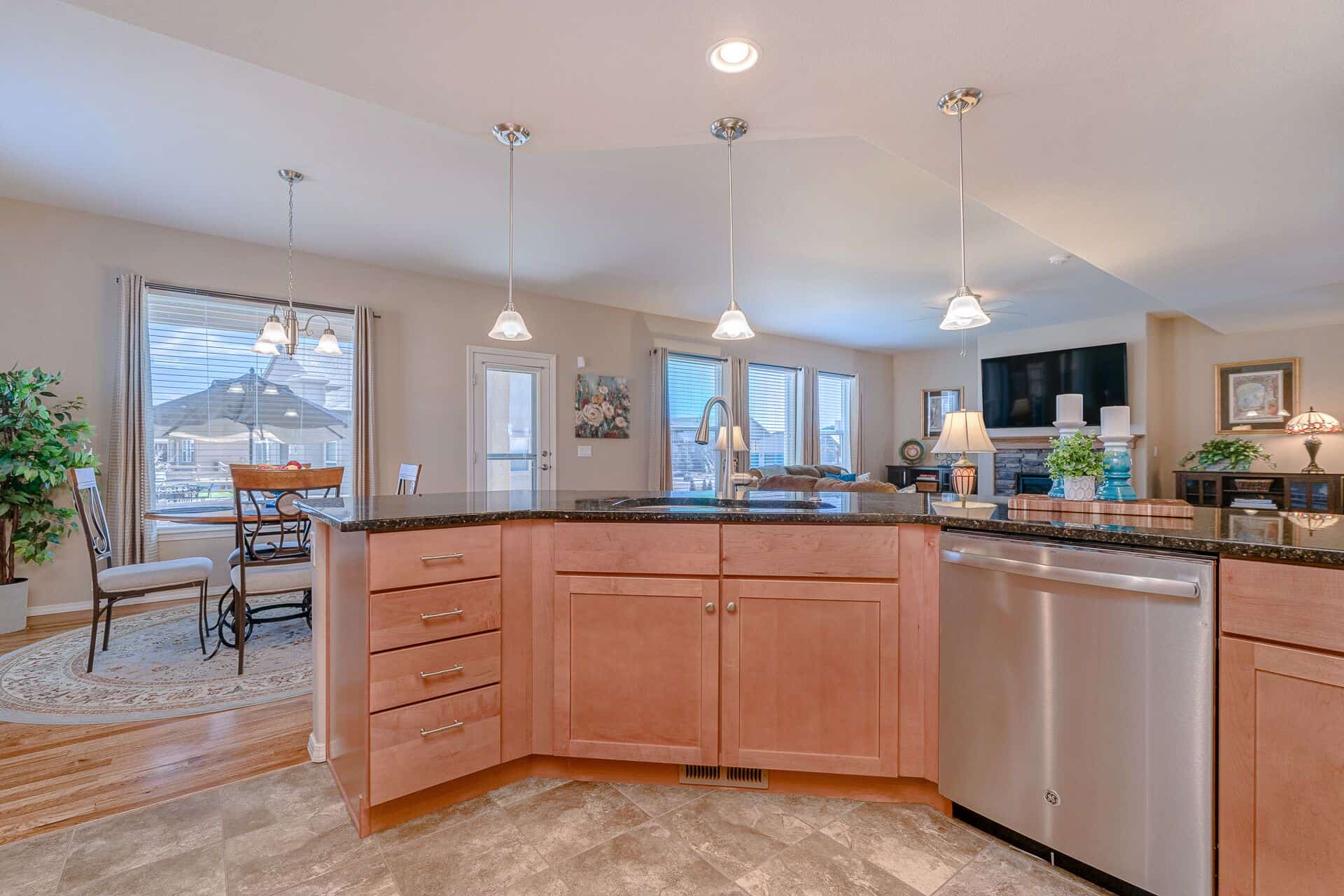 Stainless Steel Dishwasher and Tile Floors in Kitchen