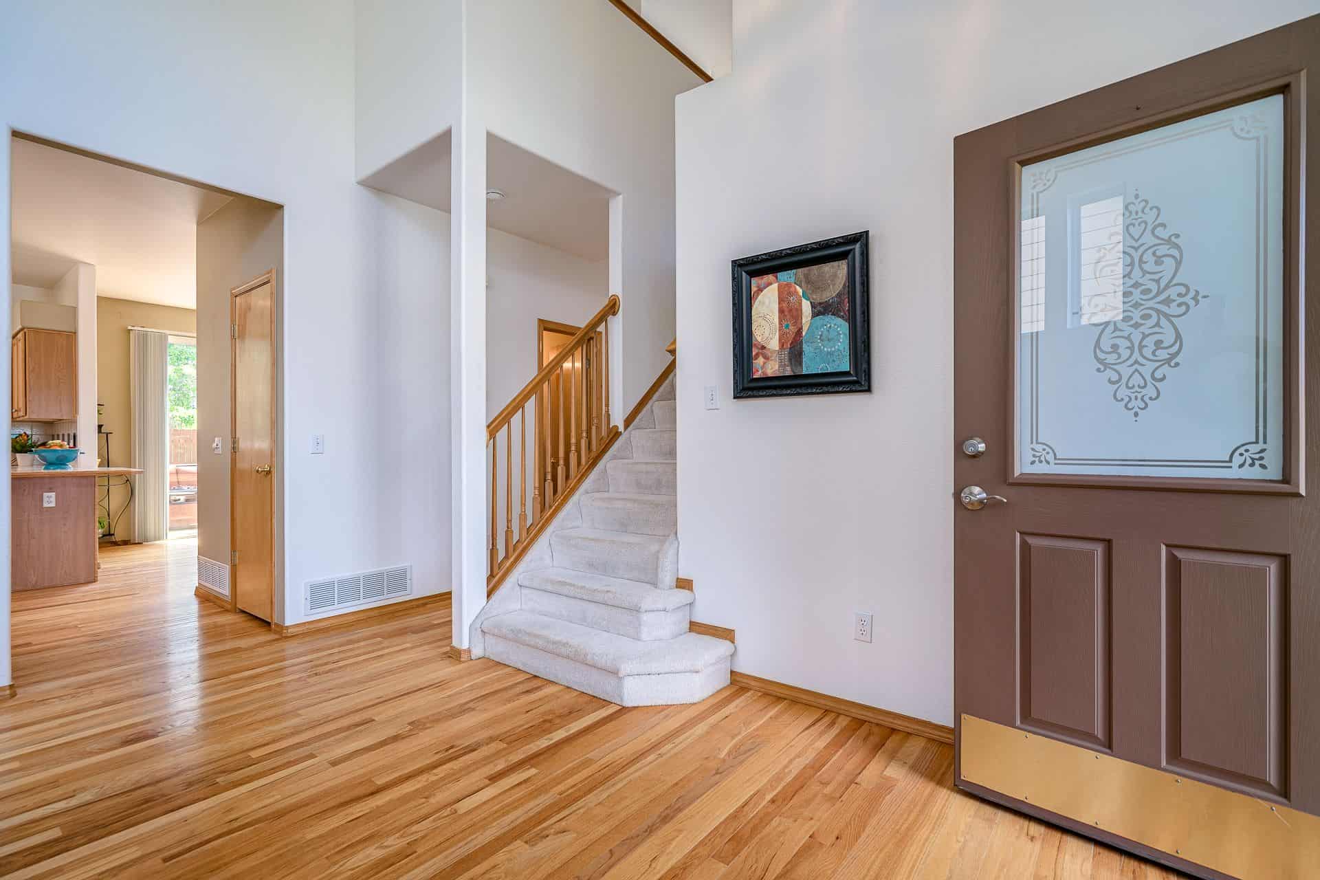 Wood Entry with High Ceilings
