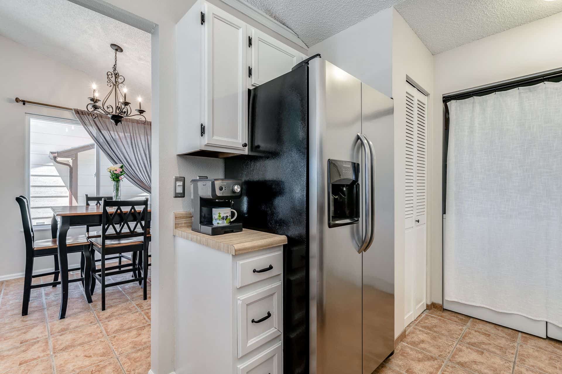 Stainless Steel Refrigerator, Pantry, and Closet