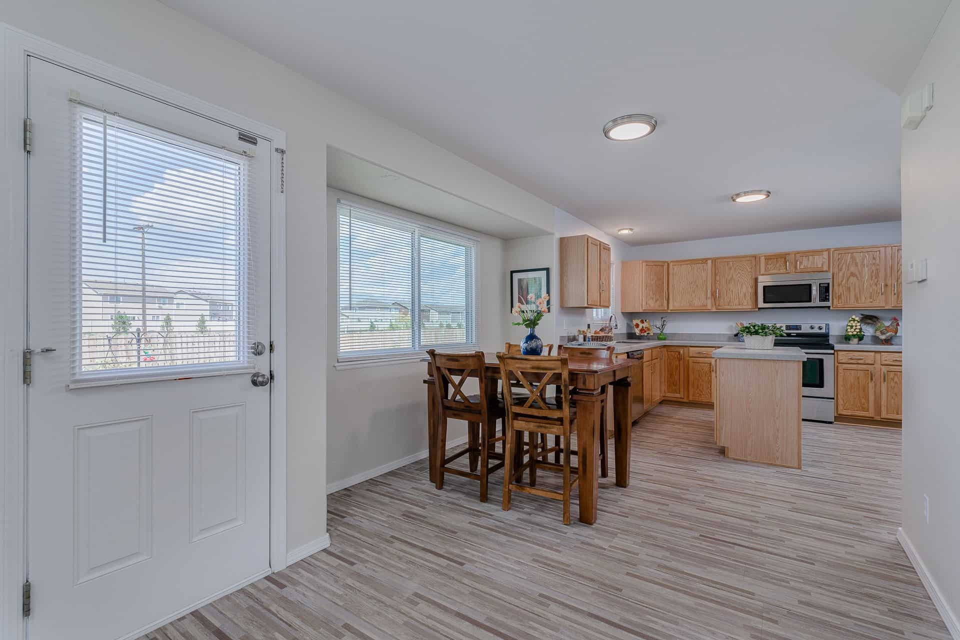 Walk out to the Backyard Patio from the Dining Area and Kitchen