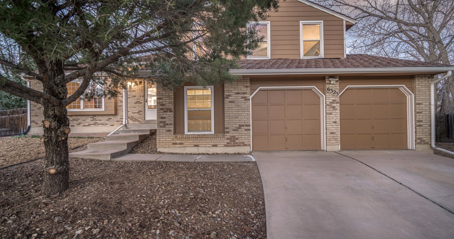 4-Level Rockrimmon Home with Peak Views