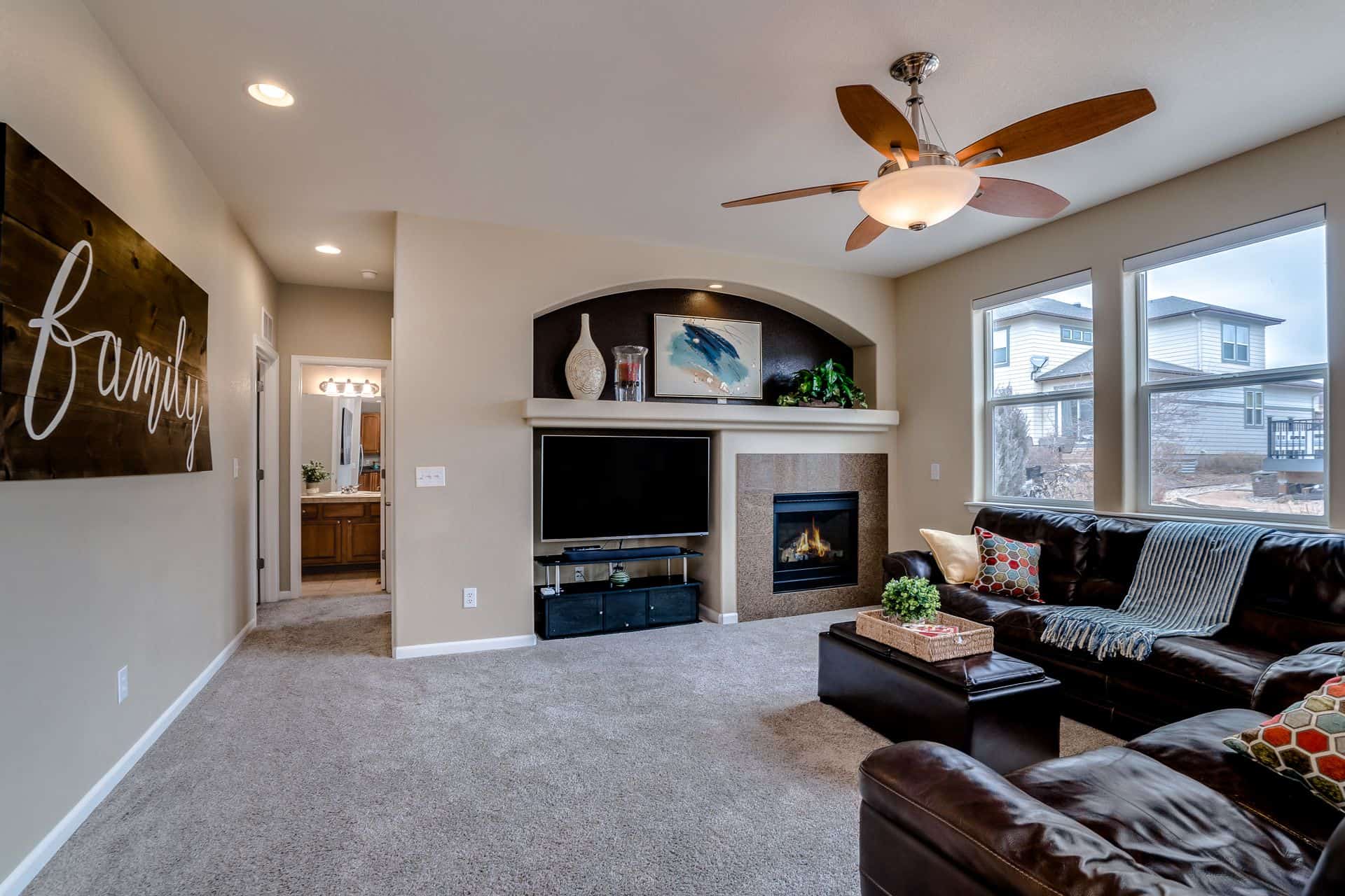 Great Room into Main Level Hallway for Bedroom and Bath