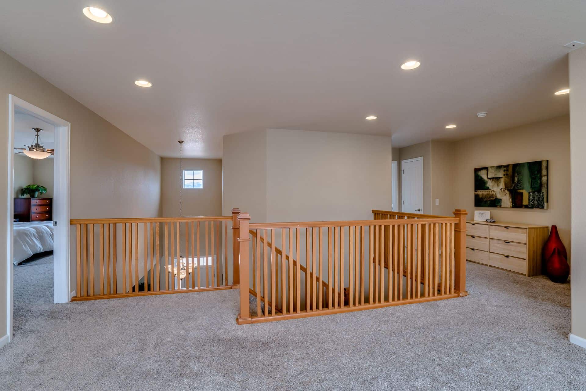 Hallway into Master Bedroom on Left and Other Bedrooms on Right
