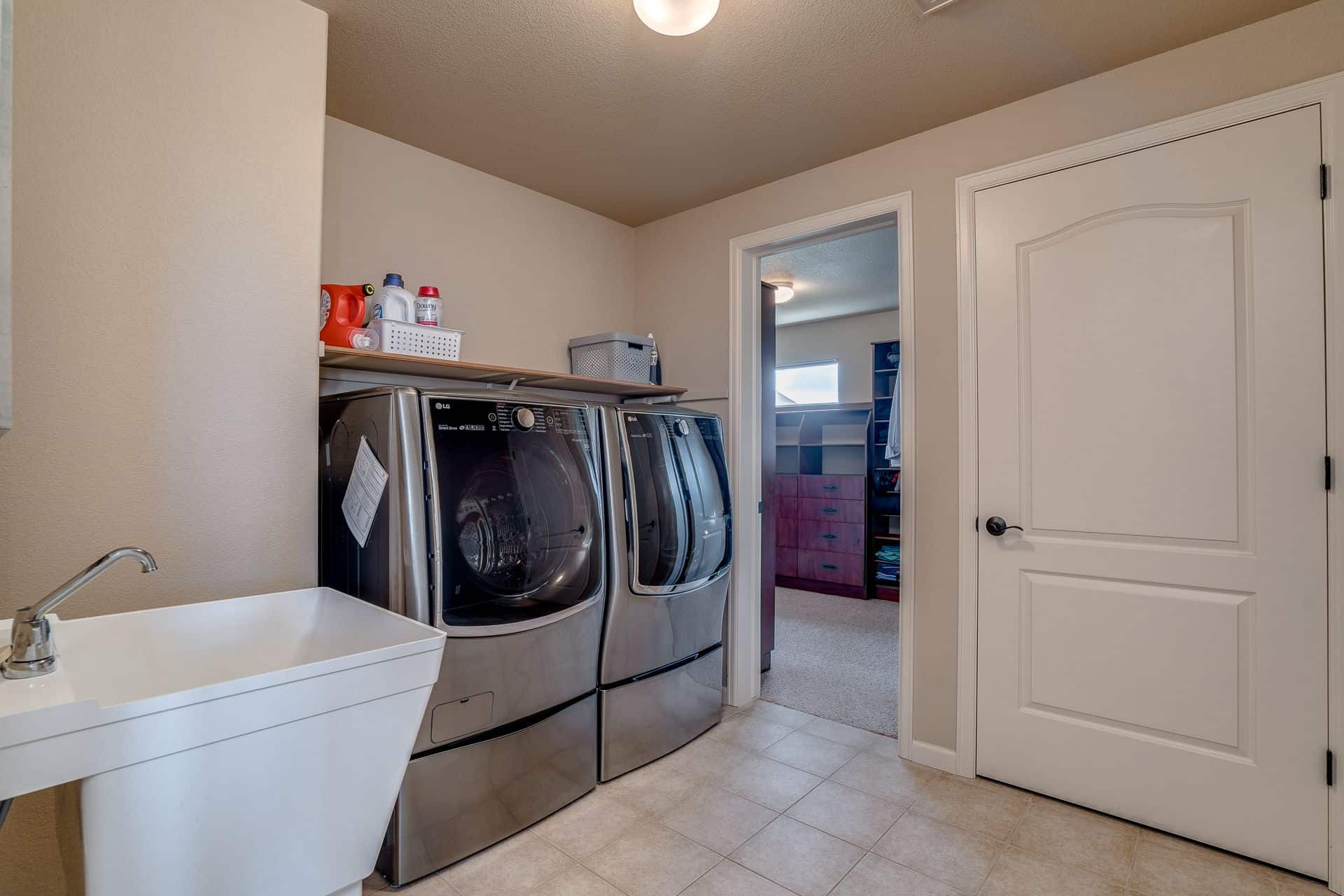 Upper Level Laundry with Access to Master Closet