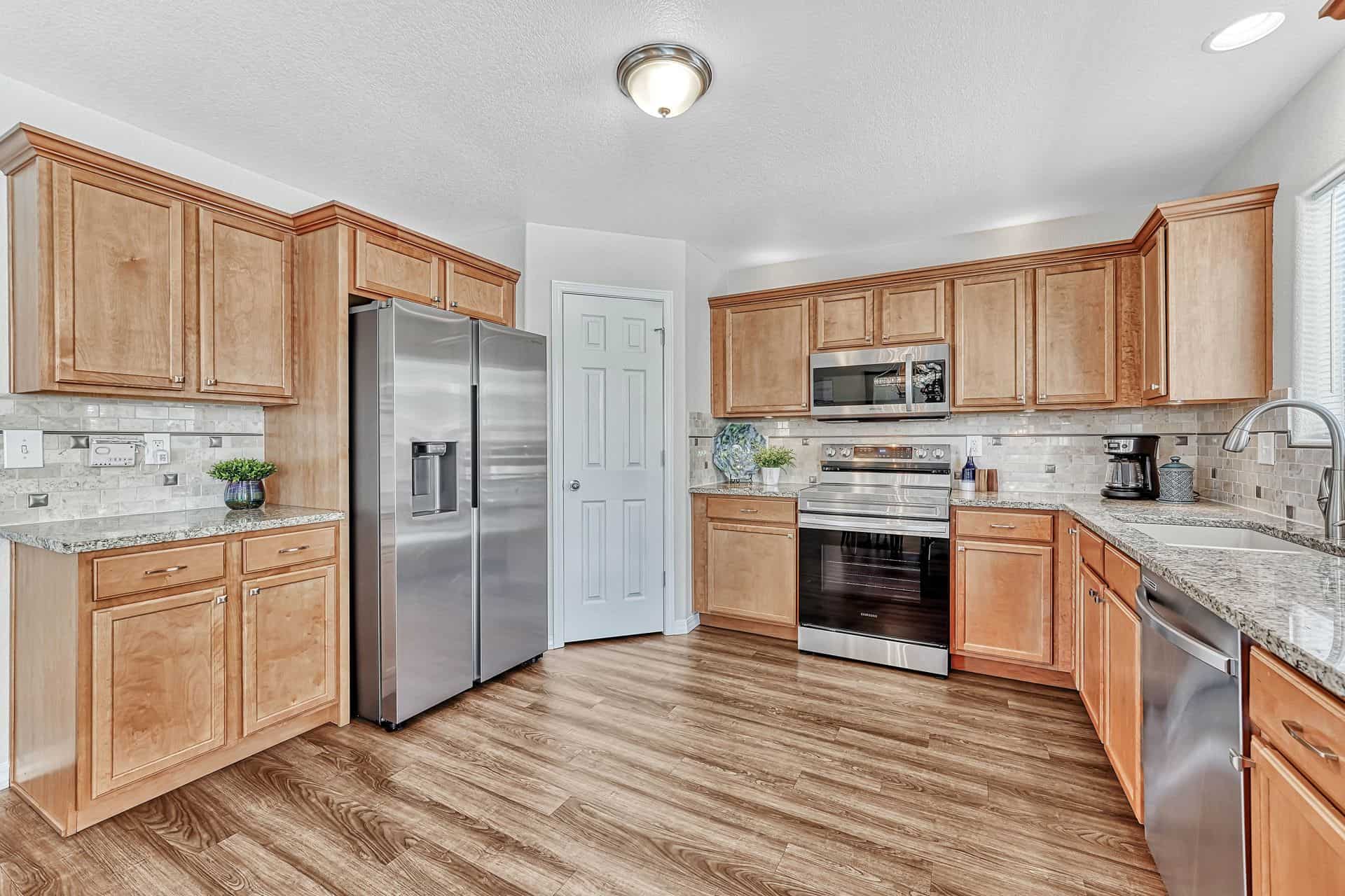 Gourmet Kitchen with Walk In Pantry and Stainless Steel Appliances