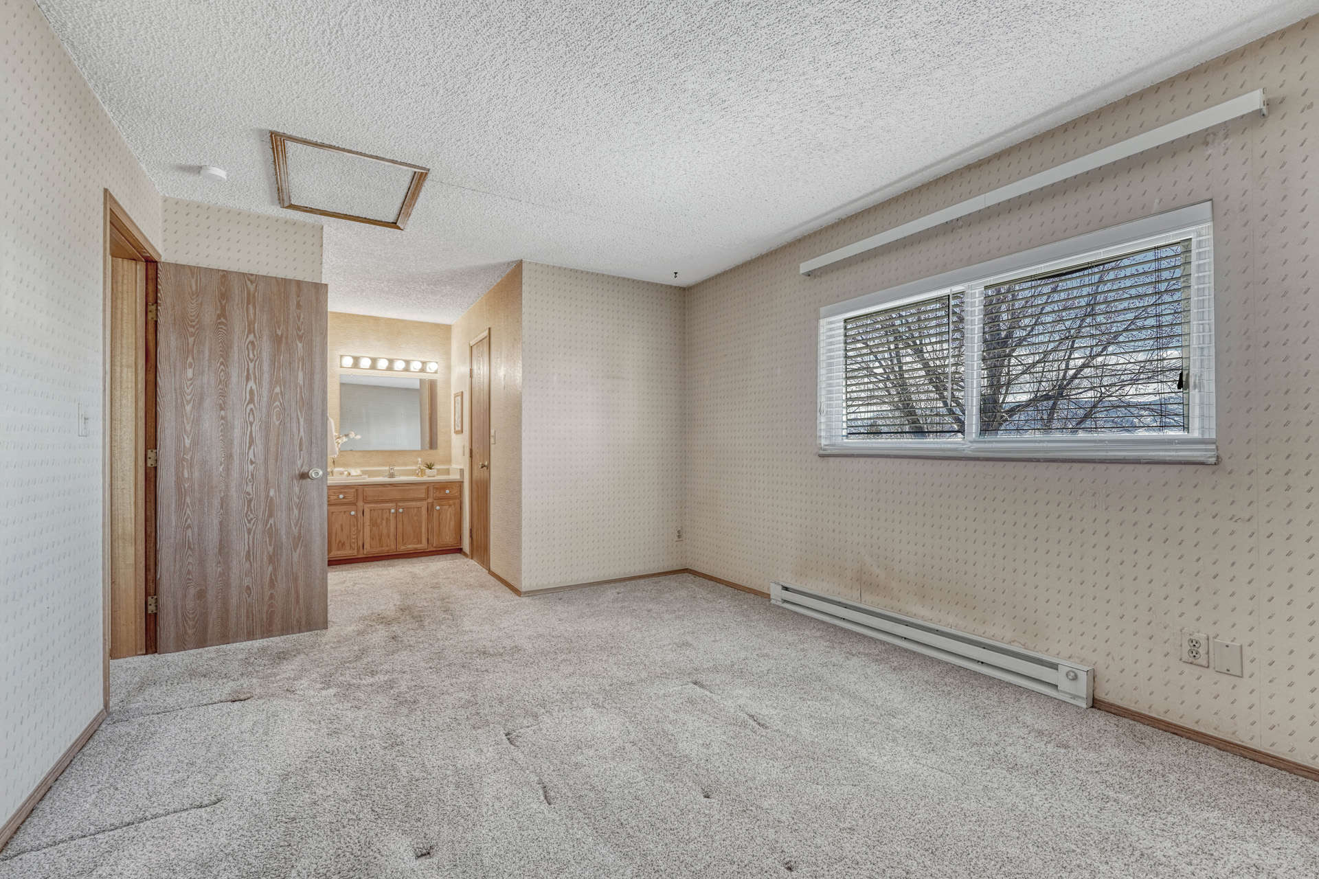 Primary Upper Level Bedroom and Vanity