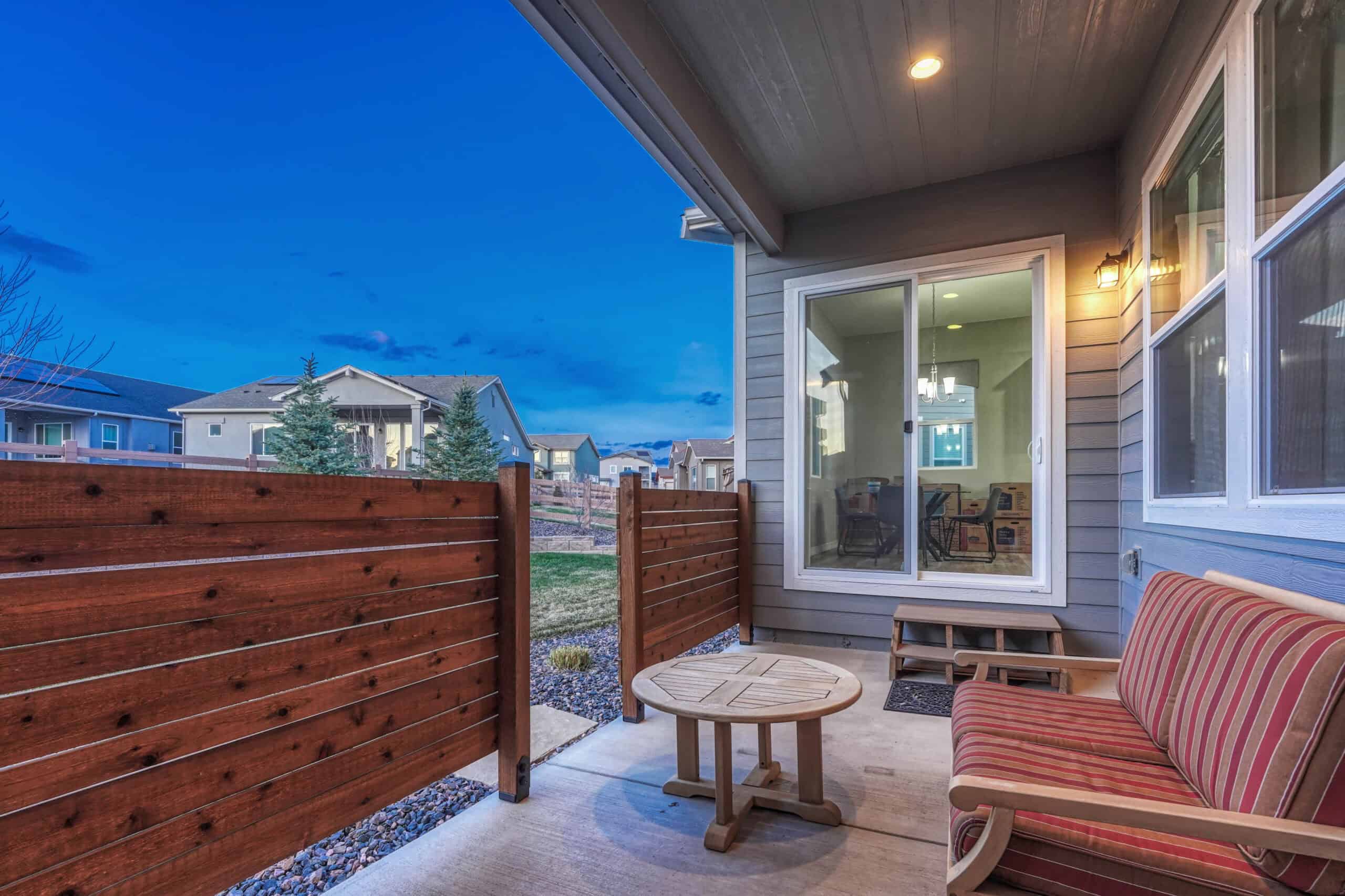 Covered Backyard Patio with Privacy Fence